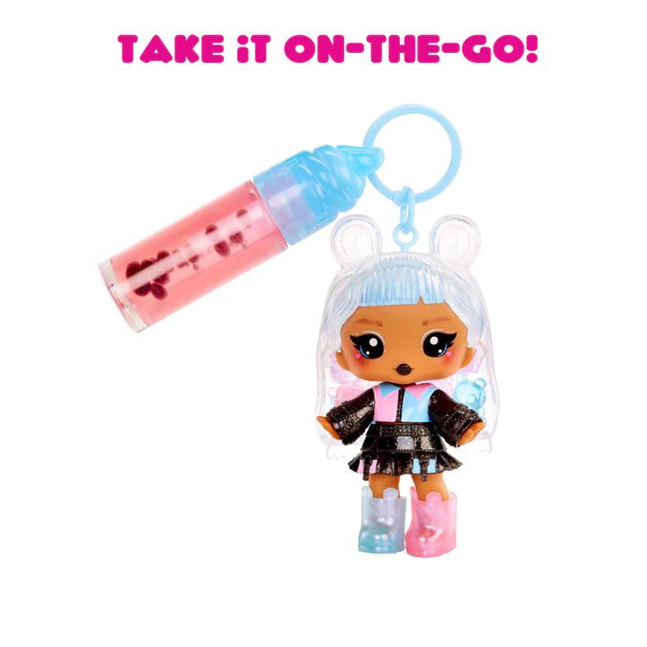 Keychain with a small doll and bottle, featuring text 'Take it on-the-go!'.
