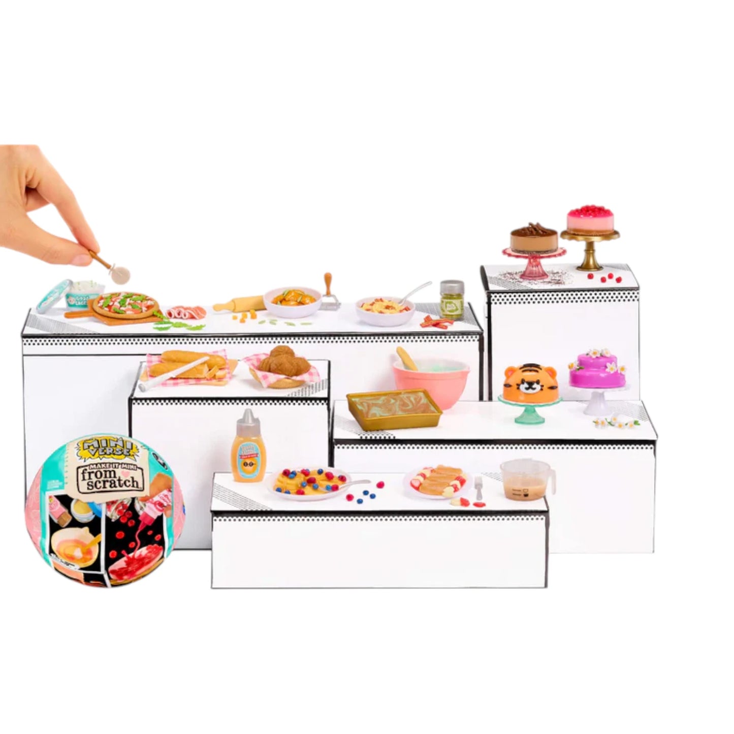 Miniverse Make It Mini From Scratch Series 2 Miniature food set with a hand holding a toy spoon over a white surface