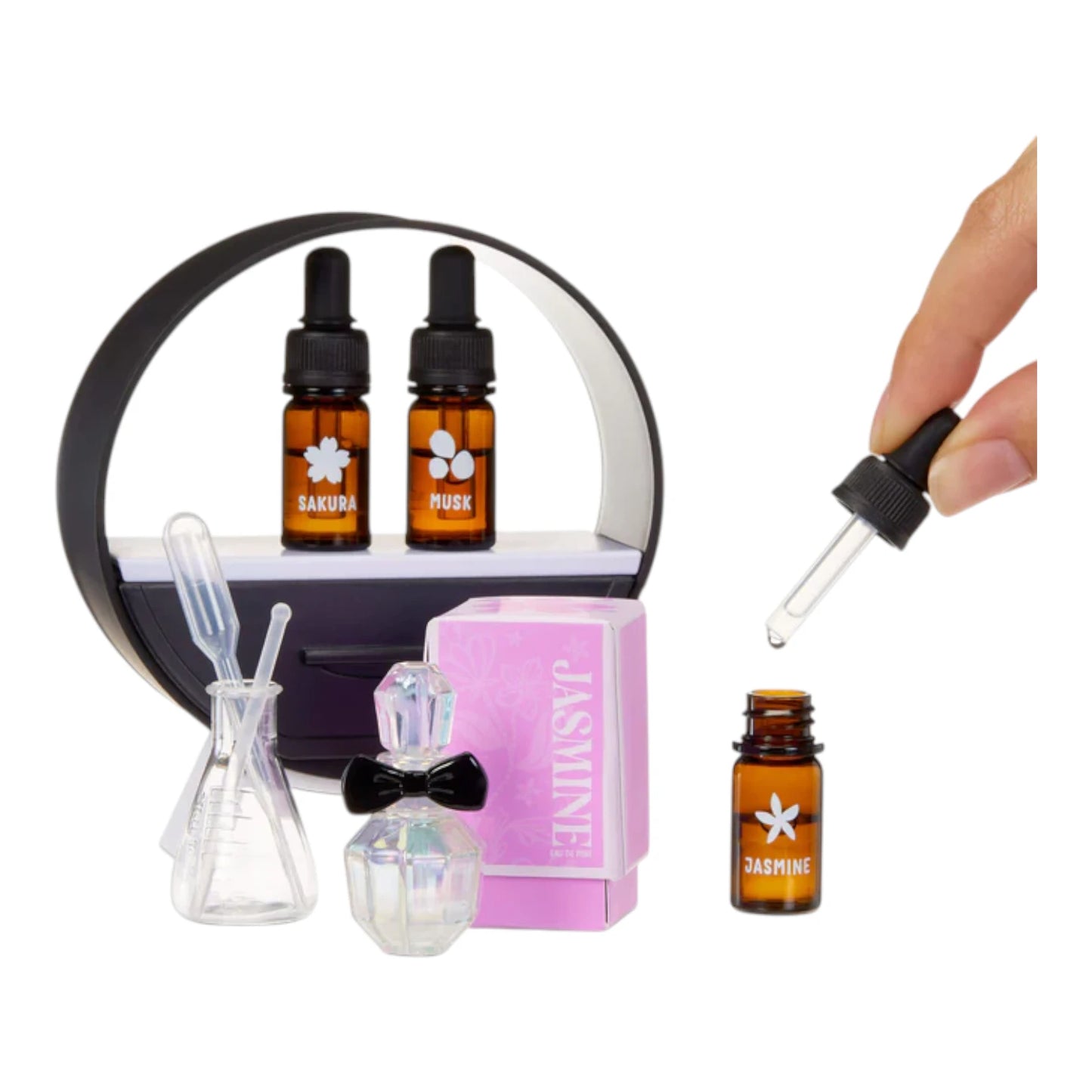 Miniverse Make It Mini Fragrances Collection of small bottles with droppers and a pink box labeled 'Jasmine' on a white background.