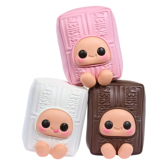 yojo Hershey's Series blind box collectible plush featuring cute expressive faces inside brown chocolate, white chocolate, and pink strawberry chocolate bar wrapper designs.
