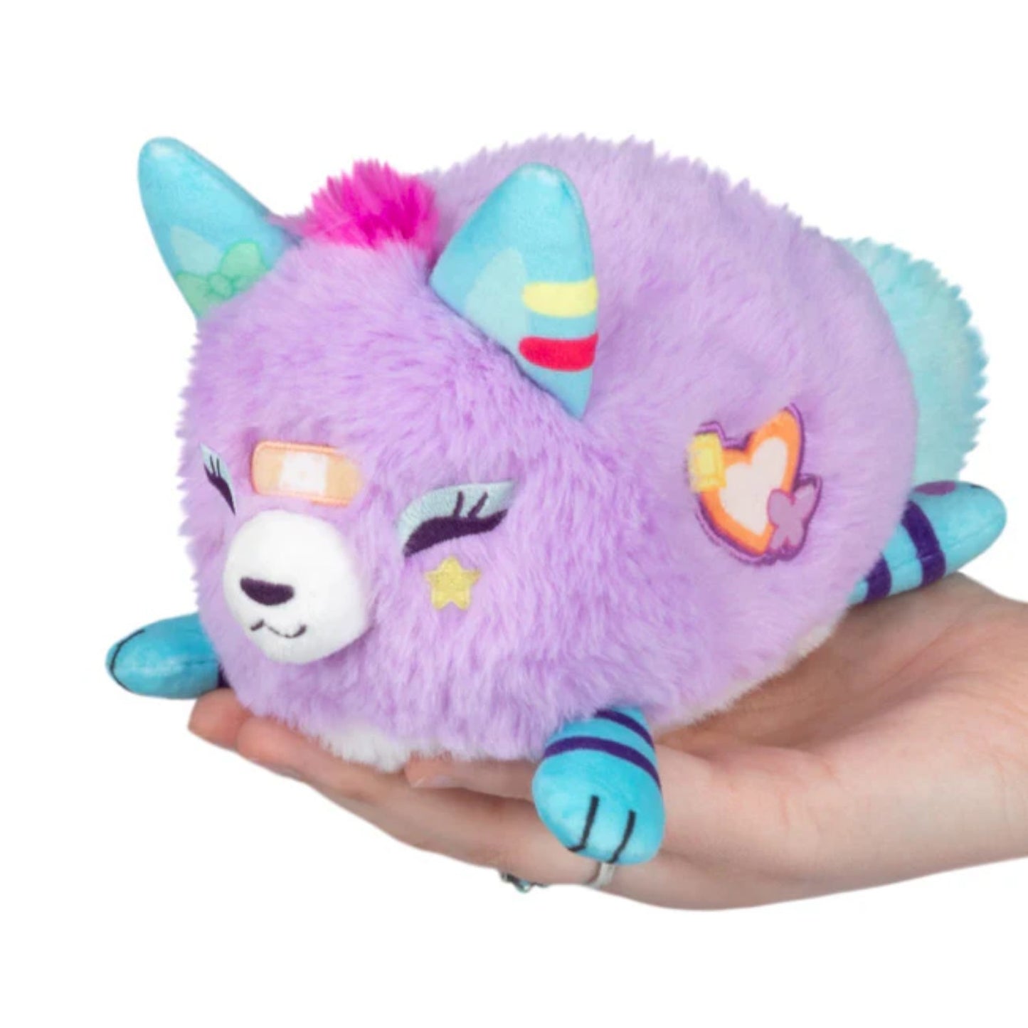Decora Kitsune plush with colorful bows and accessories