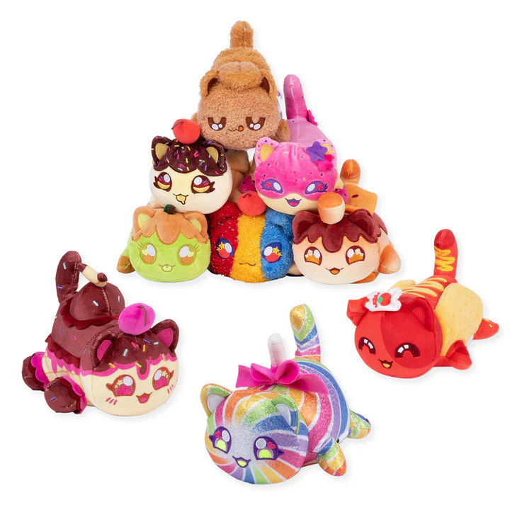 An assortment of nine different Aphmau Carnival Treats MeeMeow plush cat toys (Caramel Apple, Lollipop, Party Hat, Onion Ring, S'mores, Ice Cream Sundae, Chocolate Banana Split, Rainbow Swirl, Frosted Cookie)