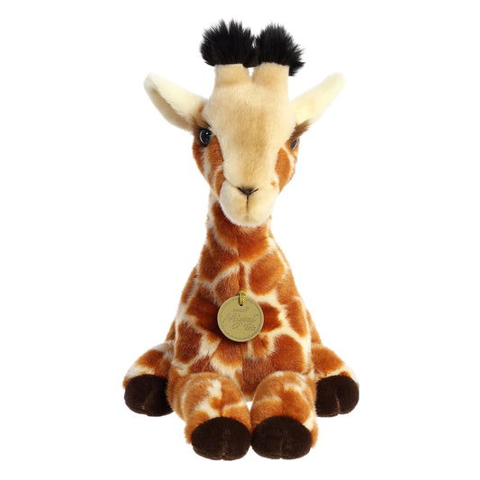 Aurora Miyoni Tots Giraffe Calf plush stuffed animal featuring realistic brown patterned patches in a resting pose.