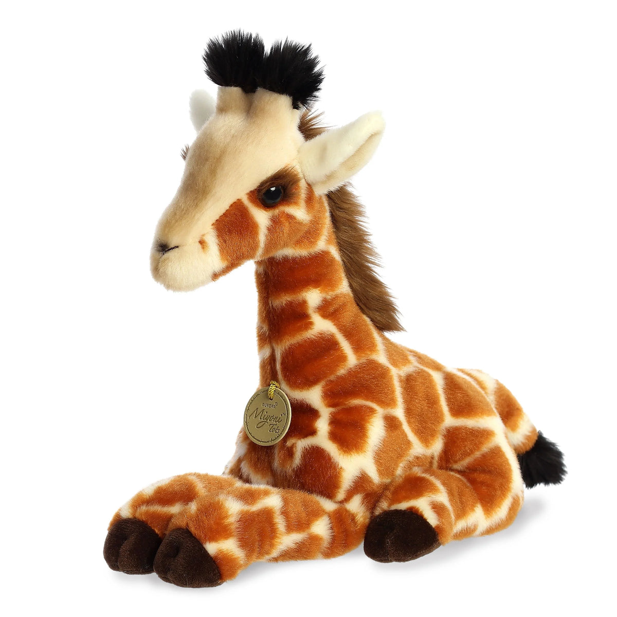 Aurora Miyoni Tots Giraffe Calf plush stuffed animal featuring realistic brown patterned patches in a resting pose.