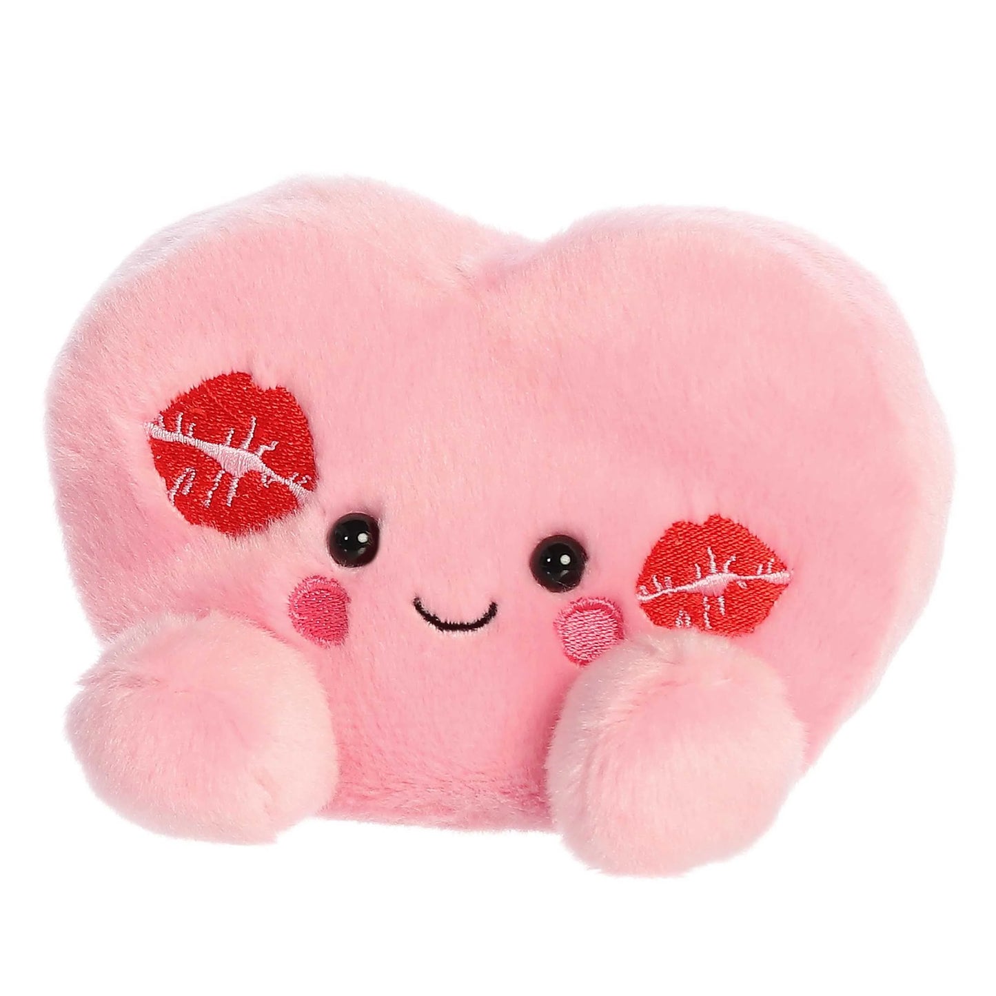 Angled view of Aurora Palm Pals Kinsley Kisses Heart plush
