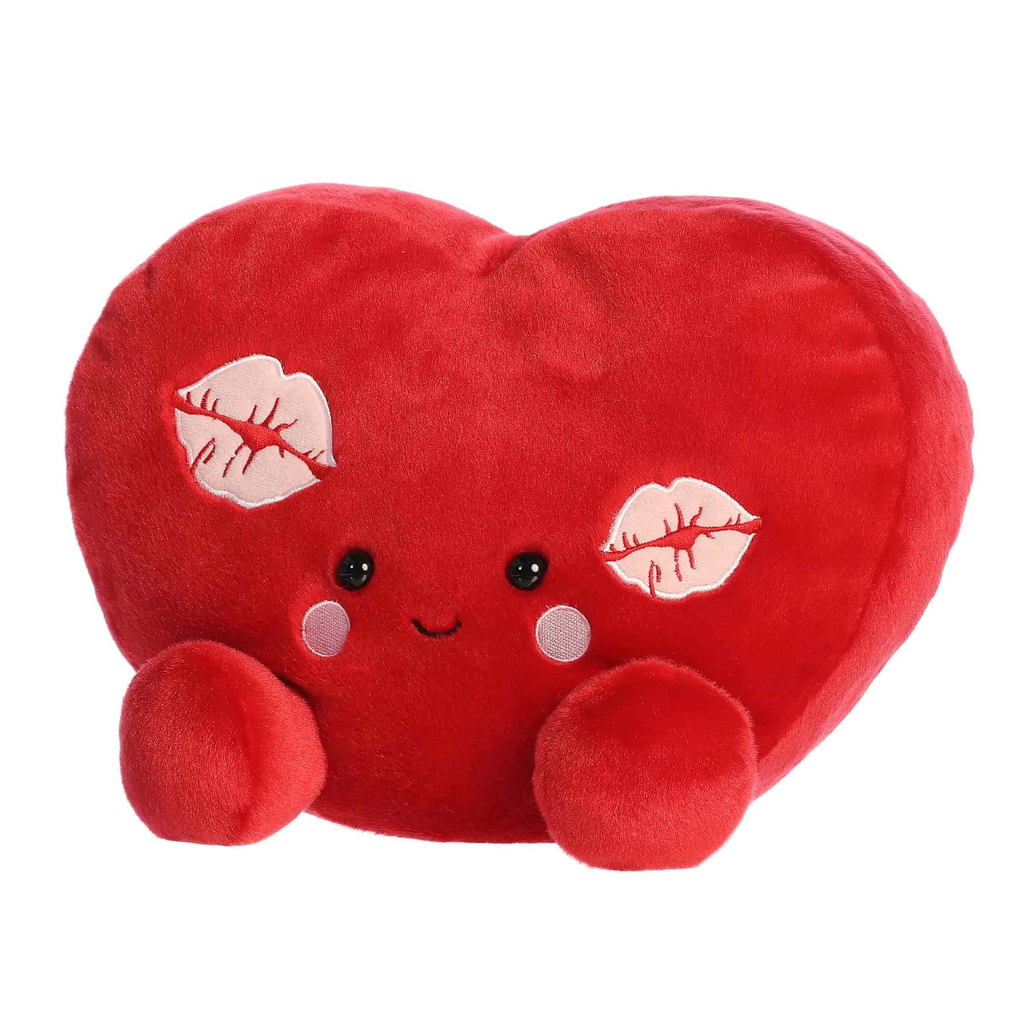 Angled view of Aurora Party-Sized Palm Pals Kimi Kisses Heart, a large 13-inch red plush heart.