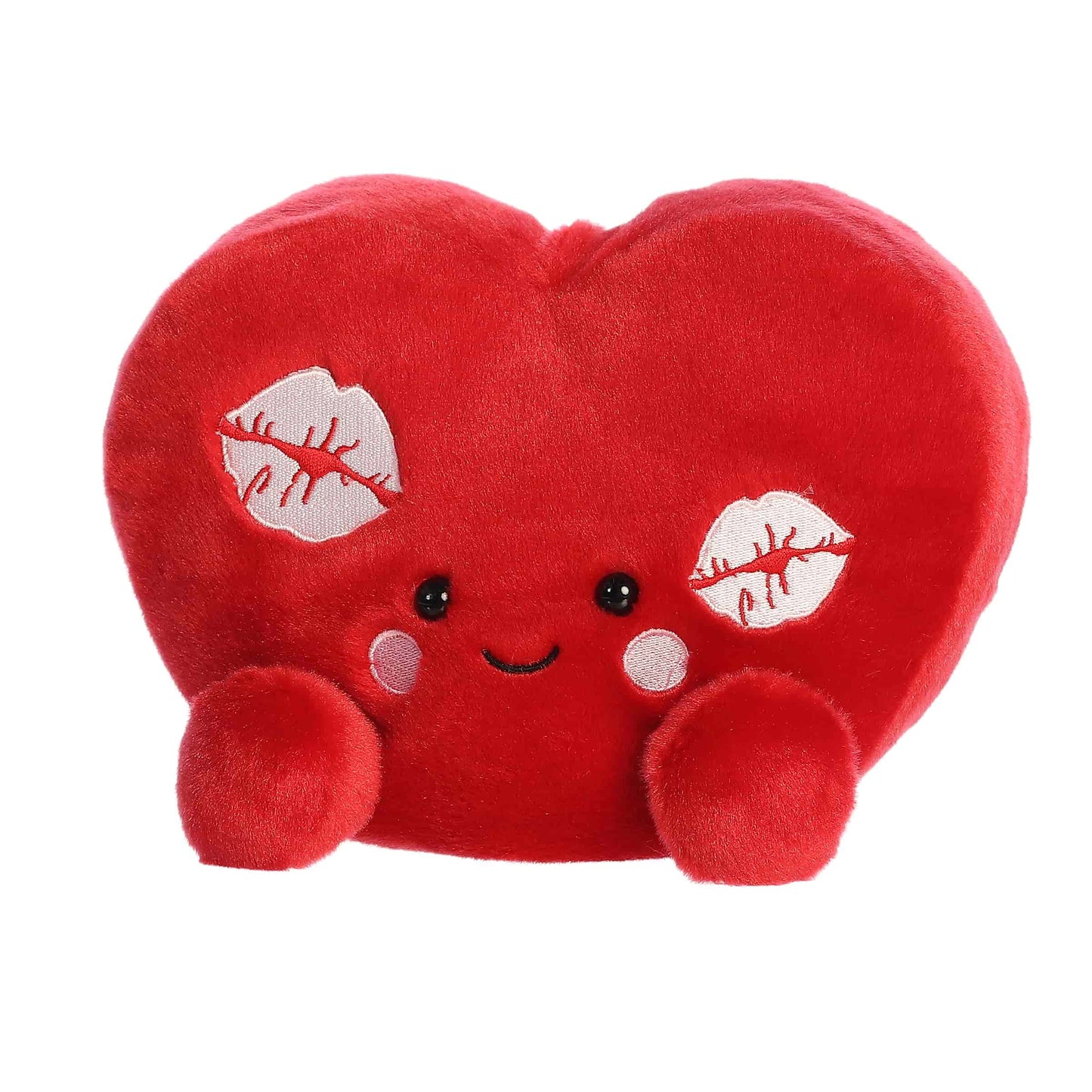 Angled view of Aurora Party-Sized Palm Pals Kimi Kisses Heart, an 8-inch red plush heart.