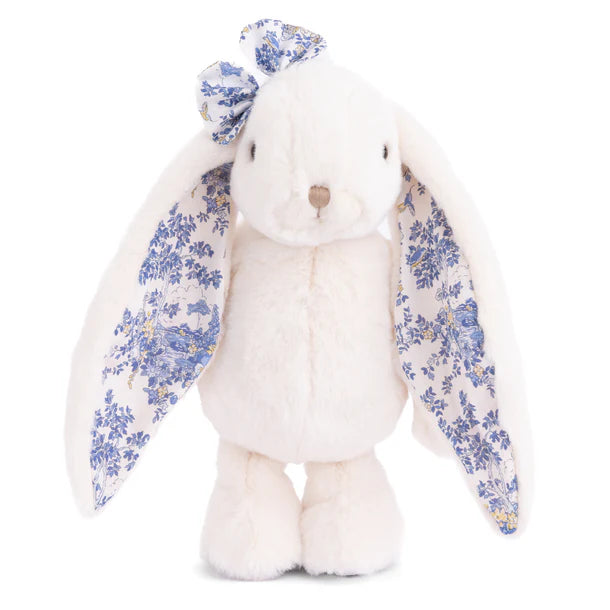 Friendly Kanina white bunny plush by Bukowski Bears, featuring long floppy ears and a bow in a blue floral pattern.