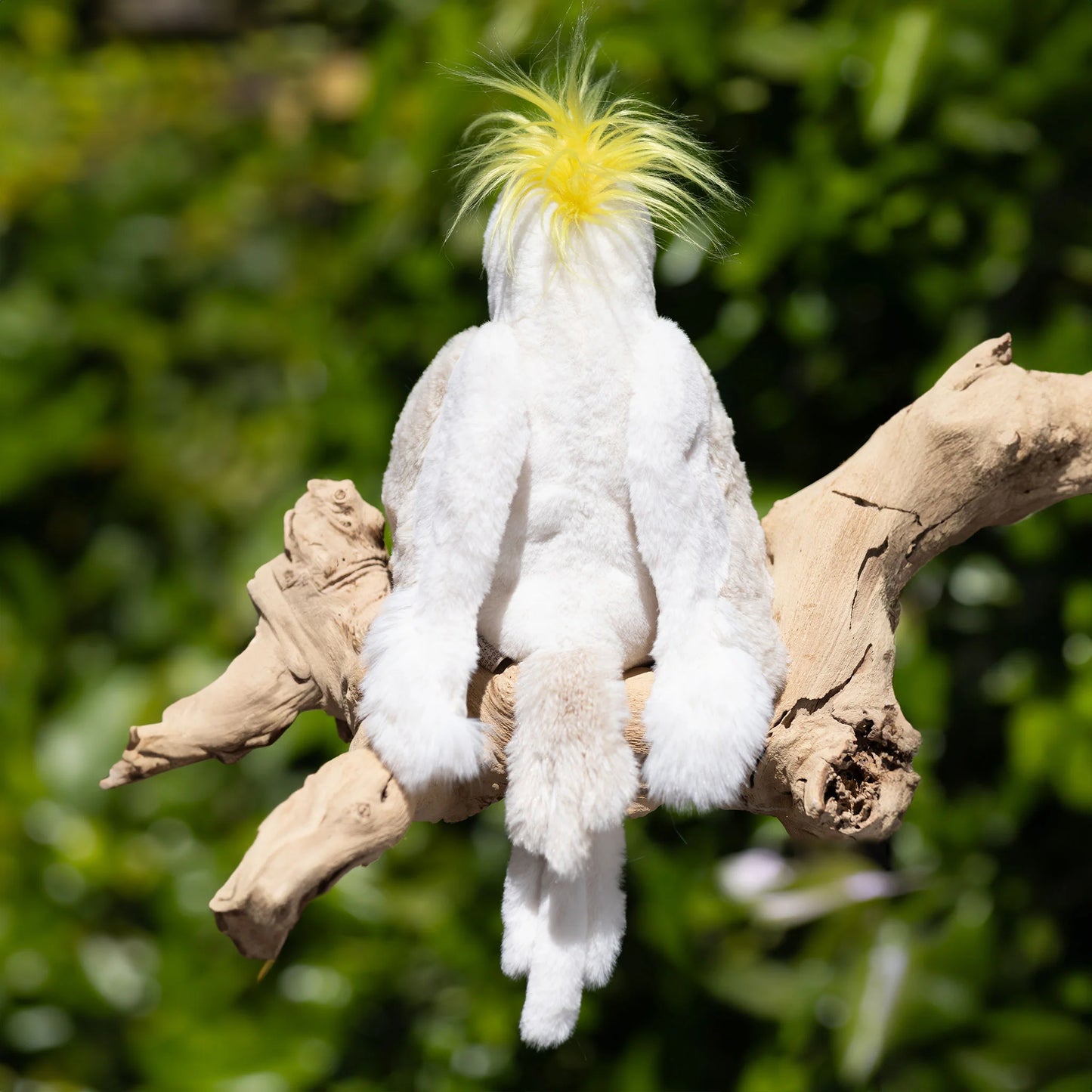 Bukowski Bears Mango cockatoo plush featuring brilliant white feathers, a striking yellow crest on its head, and a dark grey beak.