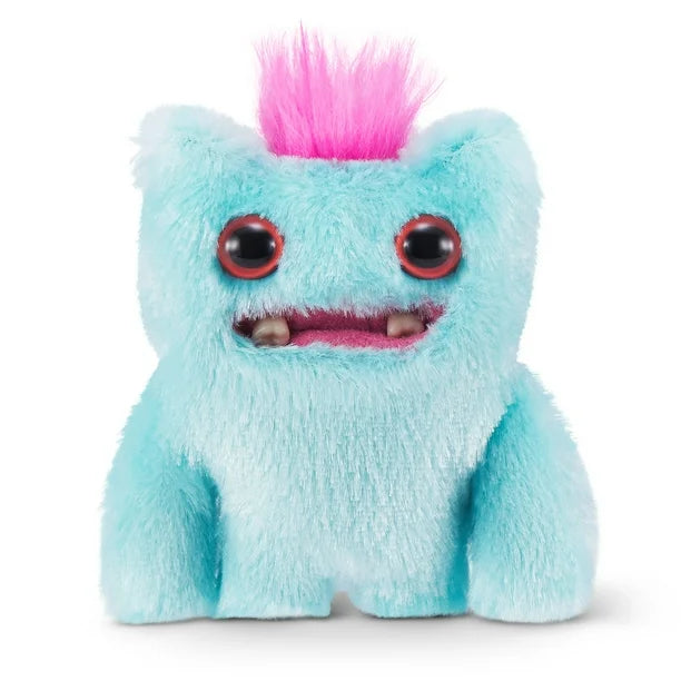 A small, teal Fuggler Baby Fugg plush toy (Wide Eyed Weirdo) with large red eyes, two white baby teeth showing in a pink mouth, and a spiky pink tuft of hair on top.
