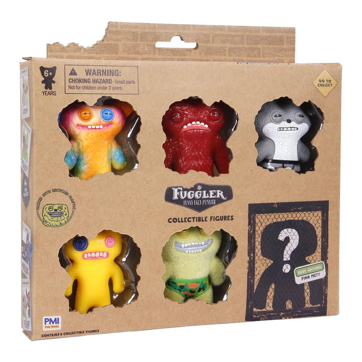 Fuggler collectible figures packaging with five colorful monster-like toys on a brown cardboard background.