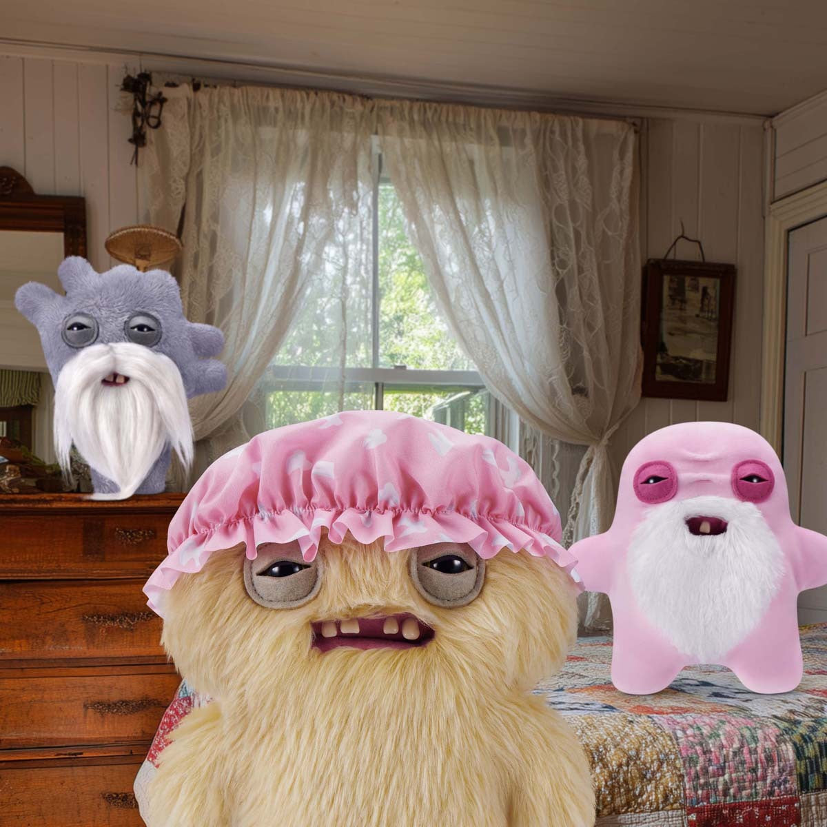 Three Fuggler Old Fogies plush in a room with curtains and furniture.