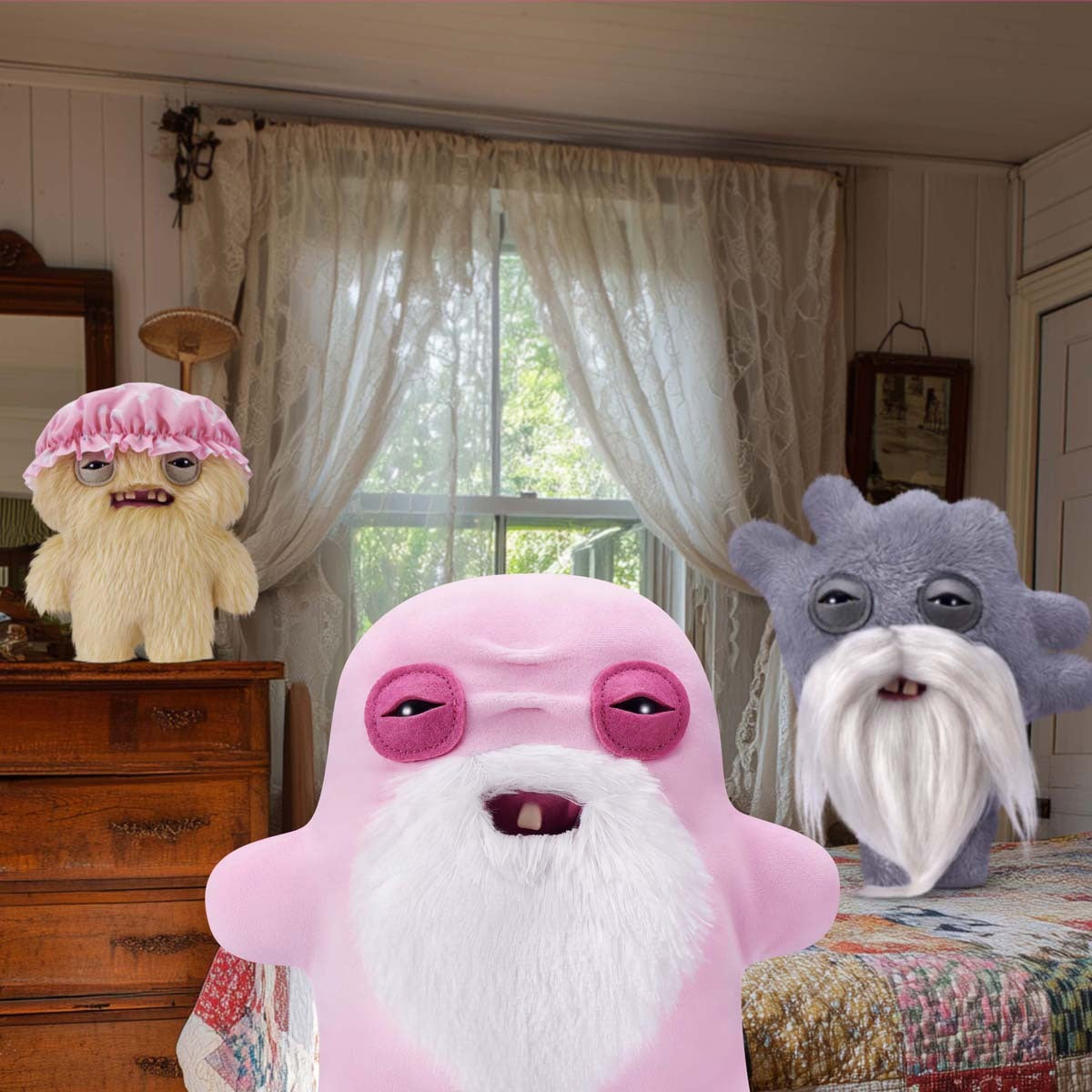 Three Fuggler Old Fogies plush in a room with curtains and furniture.