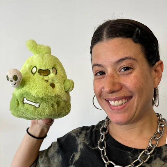 Person holding the Squishable Alter Egos Series 16 Slime Ghost 5-Inch Plush.