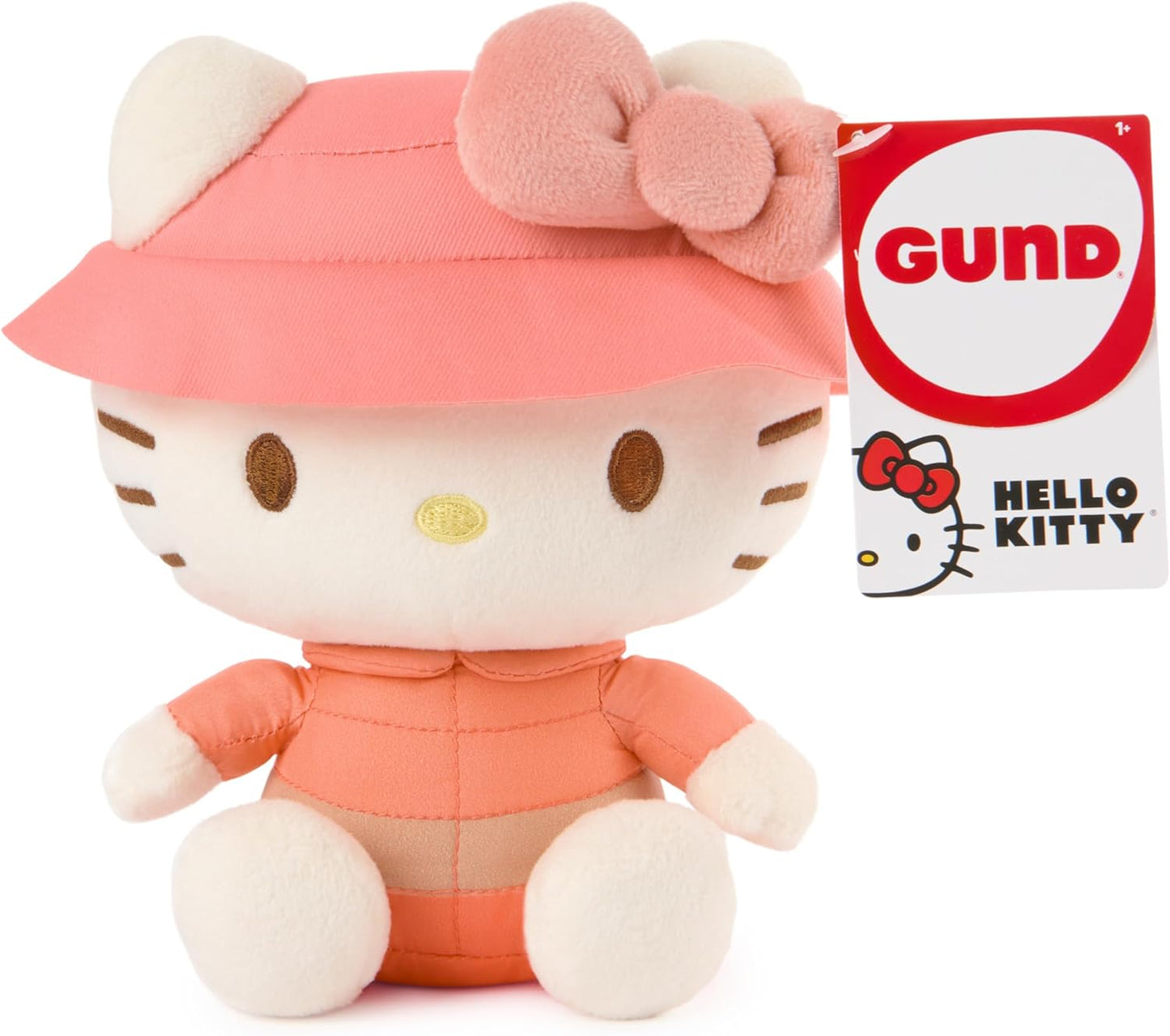 GUND Sanrio Camp Hello Kitty 6-inch plush toy wearing a coral puffer jacket and pink bucket hat