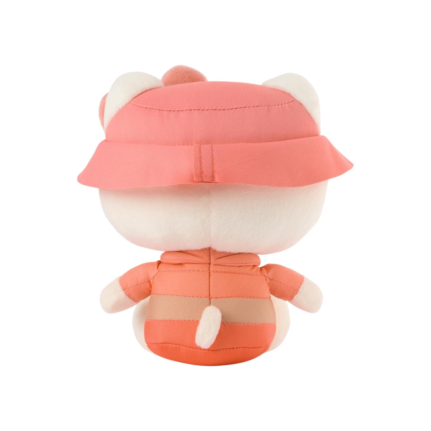 Plush toy with a pink hat and outfit on a white background