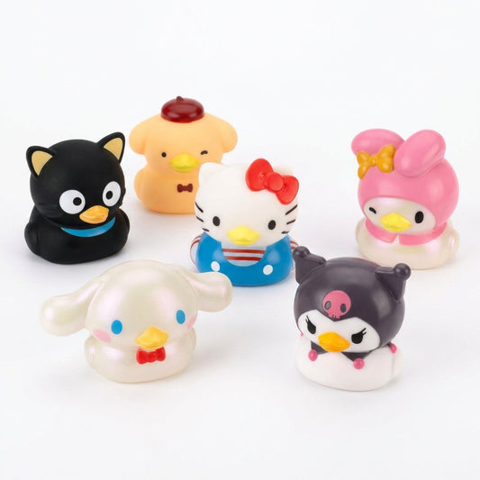 Group collection of six Hello Kitty and Friends Duckz figures including Chococat, Pompompurin, Hello Kitty, My Melody, Cinnamoroll, and Kuromi.