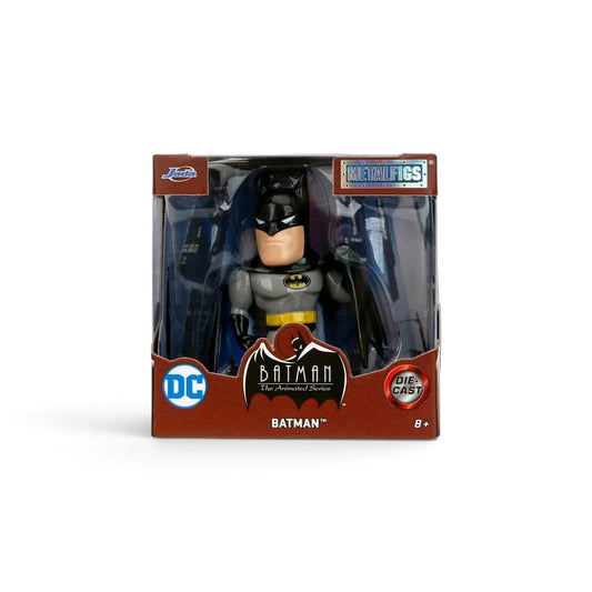 Batman die-cast metal figure in its original window box packaging, featuring the Batman character with a gray and black suit and yellow belt, set against a plain white background.
