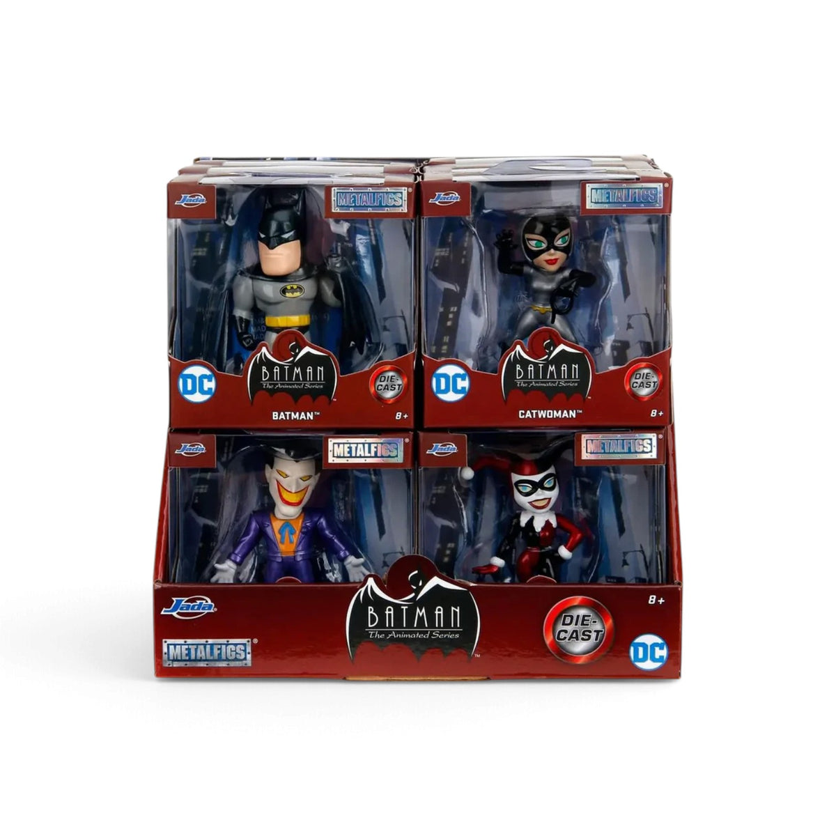 Batman The Animated Series Metalfigs die-cast metal action figure set of four, featuring Batman, Catwoman, Joker, and Harley Quinn in retail packaging on a white background.