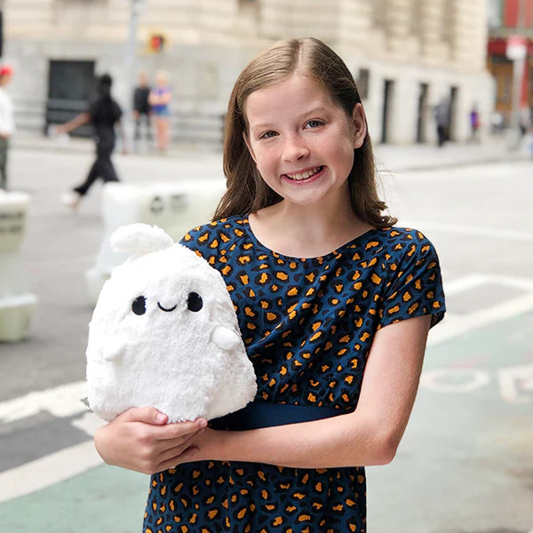Girl holding Squishable Mini Spooky Ghost