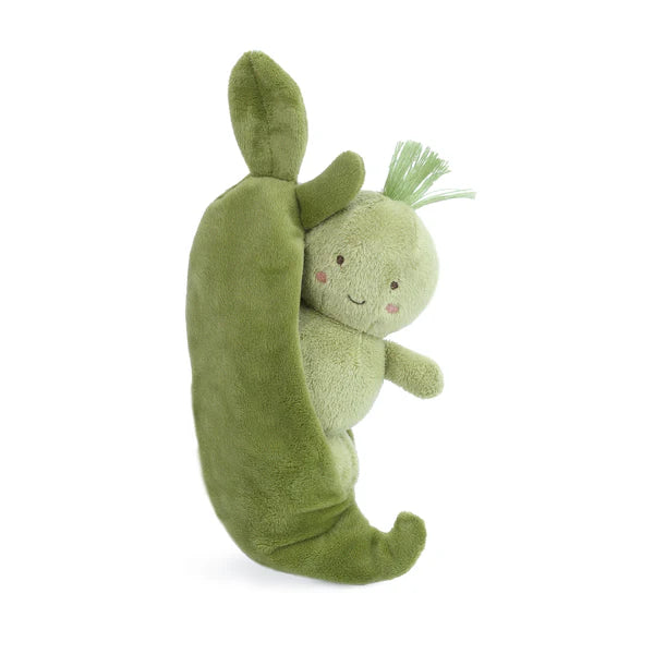 A plush toy featuring an open green pea pod with a smaller, smiling green pea doll nestled inside. Both have embroidered faces