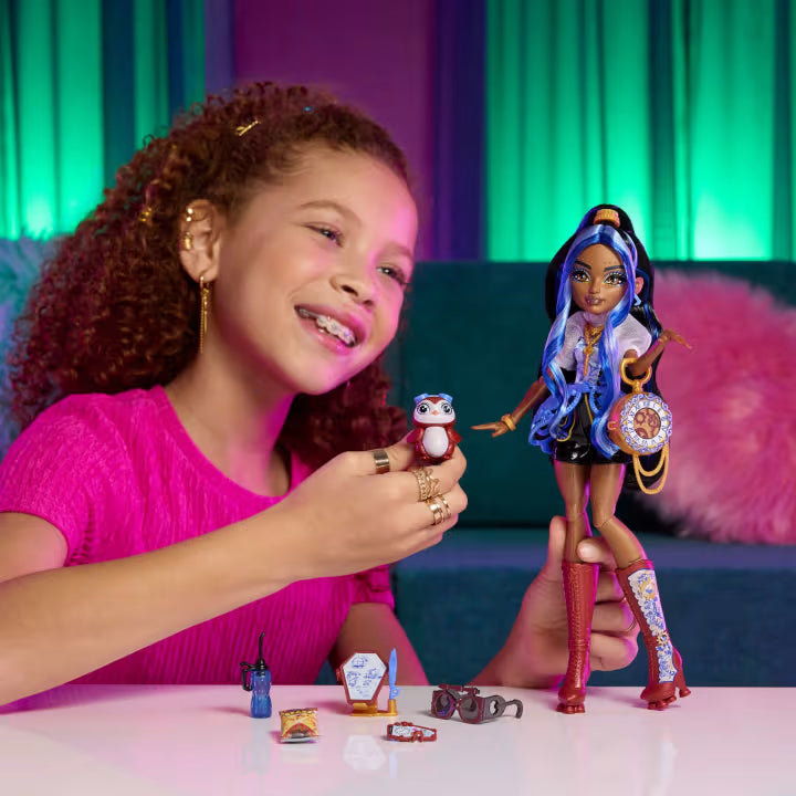 Monster High Robecca Steam fashion doll featuring a blue puff-sleeve blouse, red rocket boots, and her mechanical pet penguin Captain Penny.