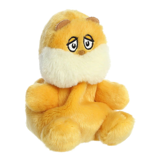 Angled view of Palm Pals Dr. Seuss The Lorax 5-inch plush soft toy