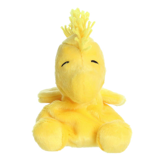 Palm Pals Peanuts Woodstock 5-inch plush, a bright yellow bird with spiky hair and smiling eyes.