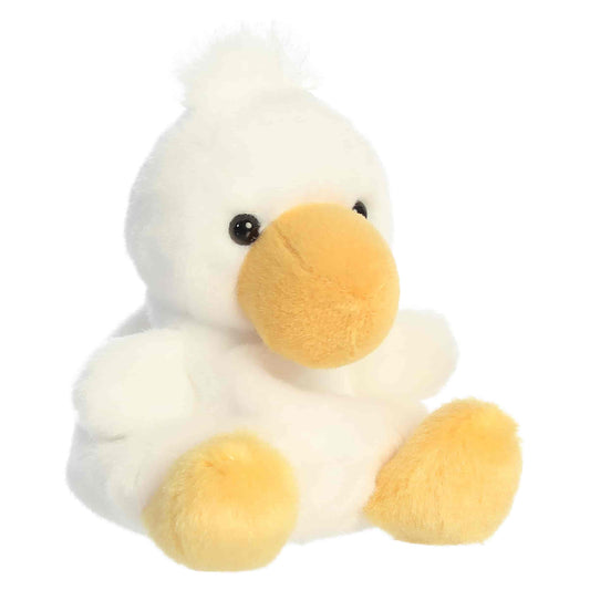 Palm Pals Percy Pelican plush featuring a soft white body, bright yellow beak, and a fuzzy tuft of hair on his head.