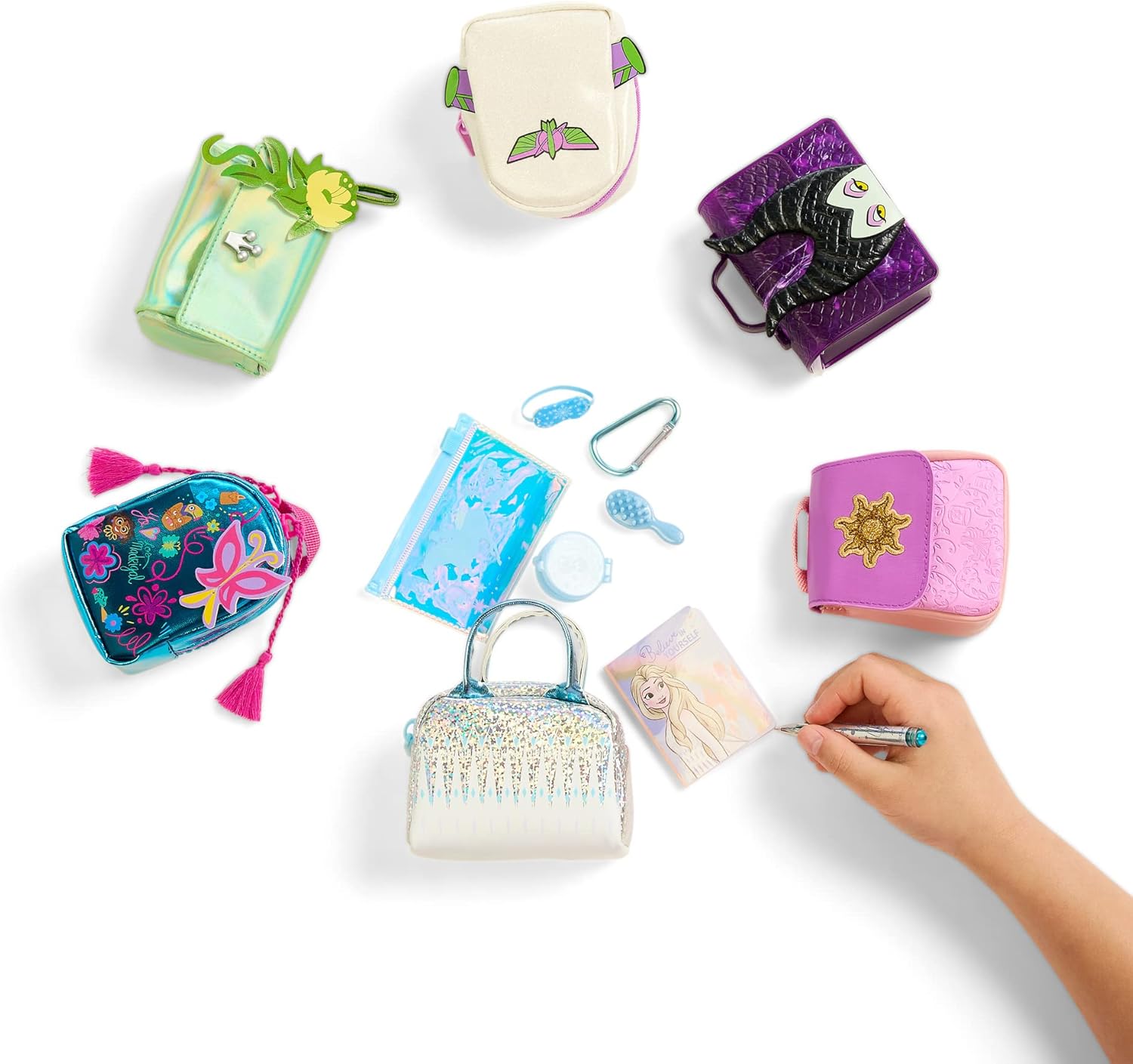 Collection of small bags and accessories on a white background with a hand holding a pen.