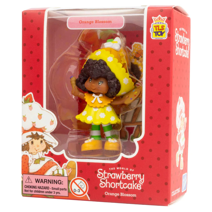 Orange Blossom CheeBee 2.5-inch collectible retro Strawberry Shortcake figure with yellow outfit, sweetly scented. figurine in packaging with red background