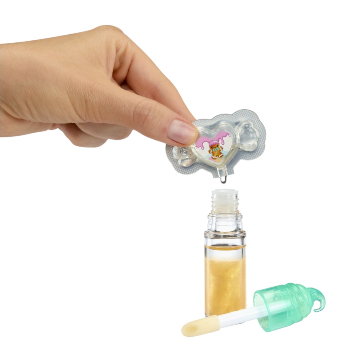 Hand holding a small container with a dropper over a bottle of liquid on a white background