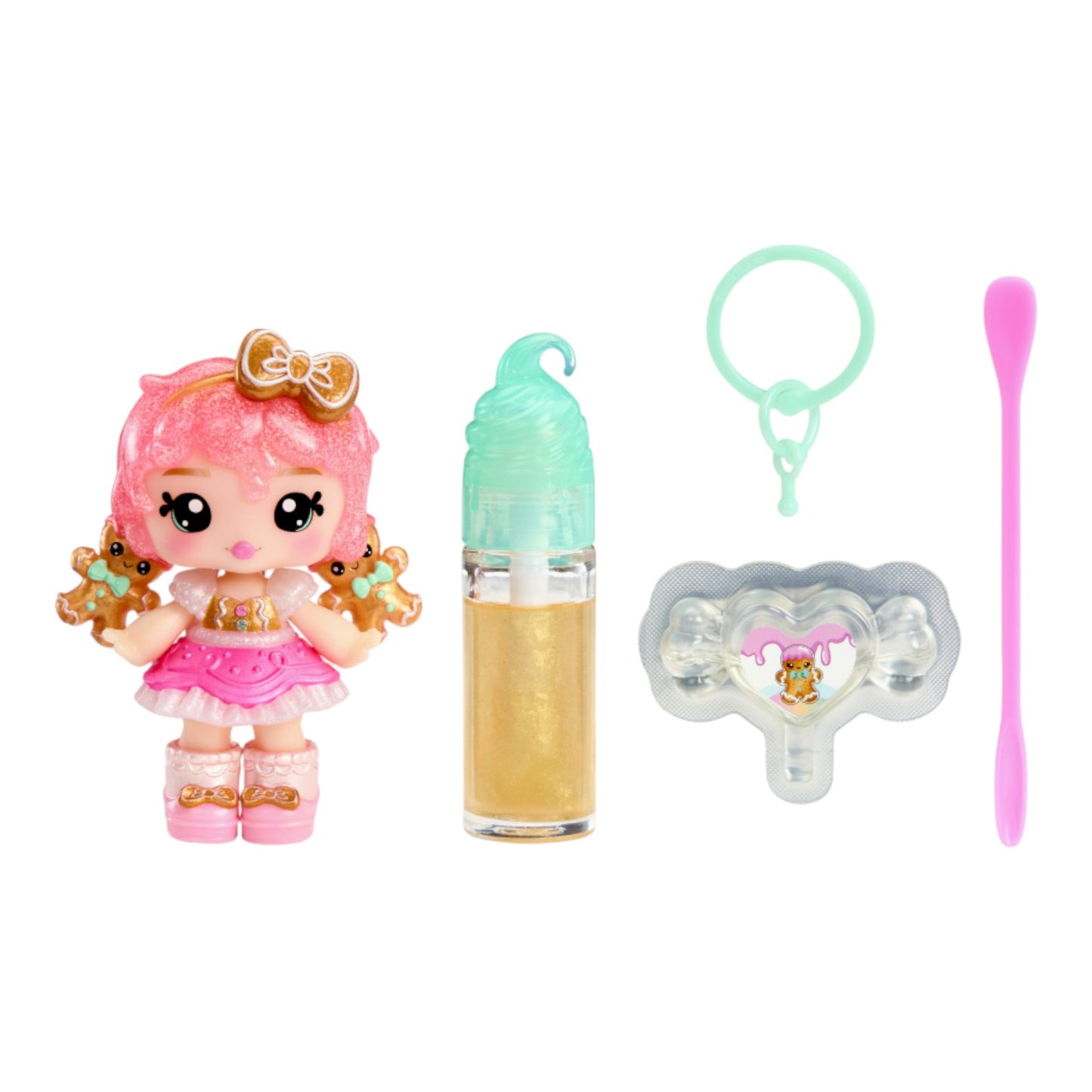 Yummiland Gigi Gingerbread Holiday Lip Gloss Doll with DIY Kit with pink hair and gingerbread cookies, accompanied by a colorful bottle, pacifier, and spoon on a white background.