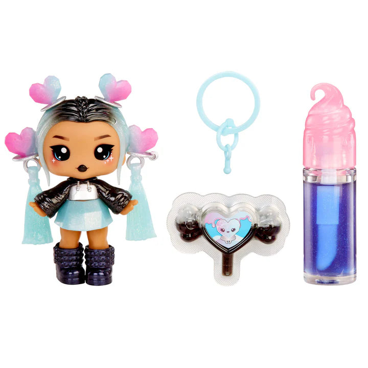 Yummiland Sour Sweeties Nina Heartpop doll with blue hair featuring pink and blue heart accents, wearing a black jacket and blue skirt, shown with DIY lava lamp lip gloss kit components including blue lip gloss tube, scented drop packet, and keychain ring.