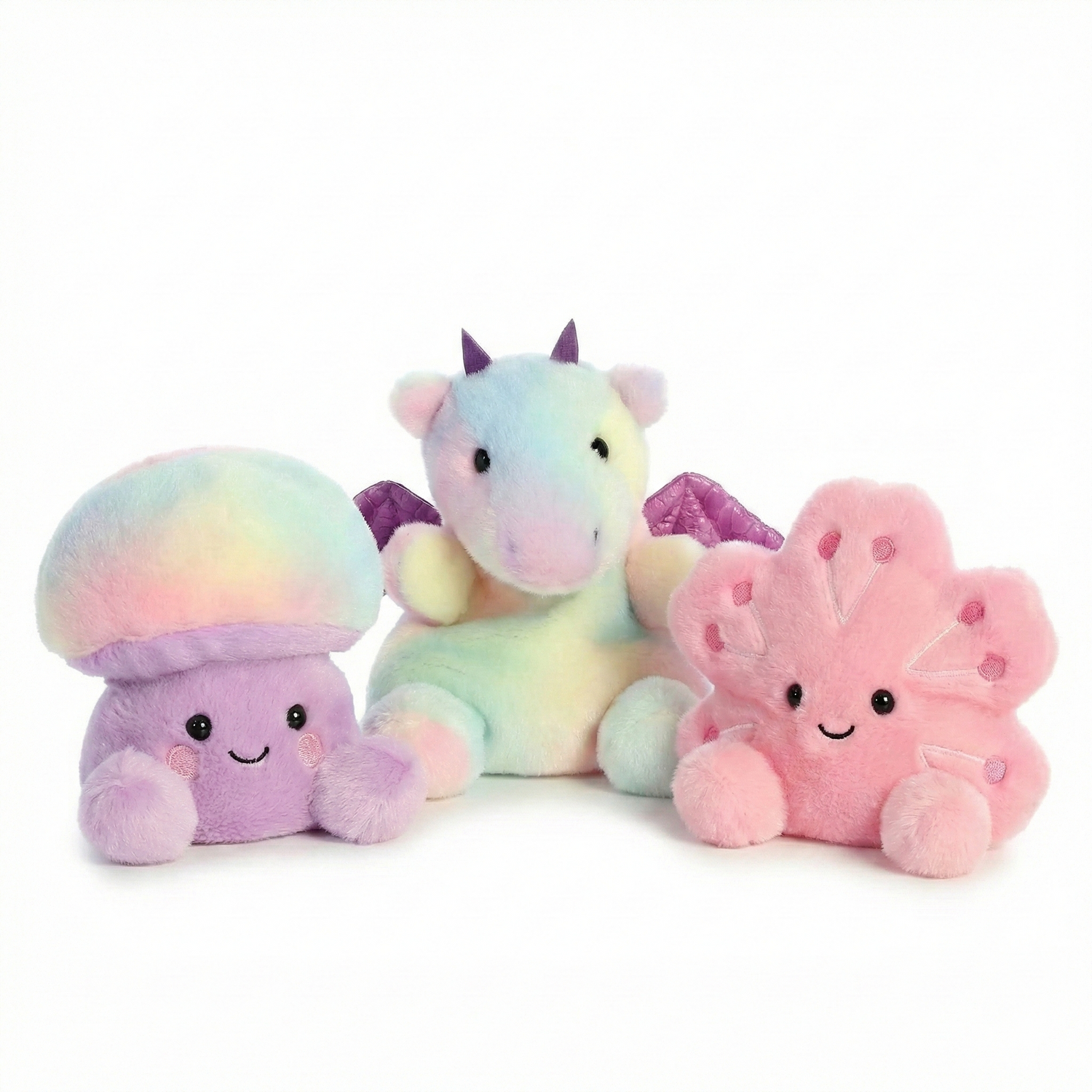 Three Palm Pals Plush - a purple mushroom, tie-dye dragon and pink sekura flower. 