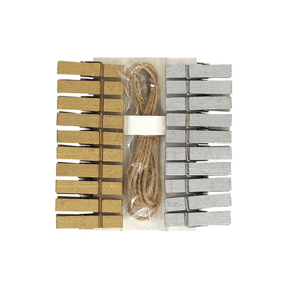 Set of wooden clothespins and twine on a white background