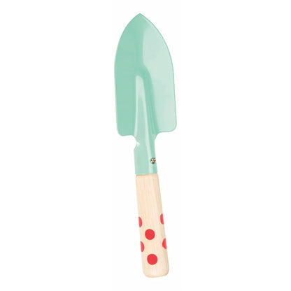 Gardening trowel with a light green head and wooden handle with red polka dots on a white background