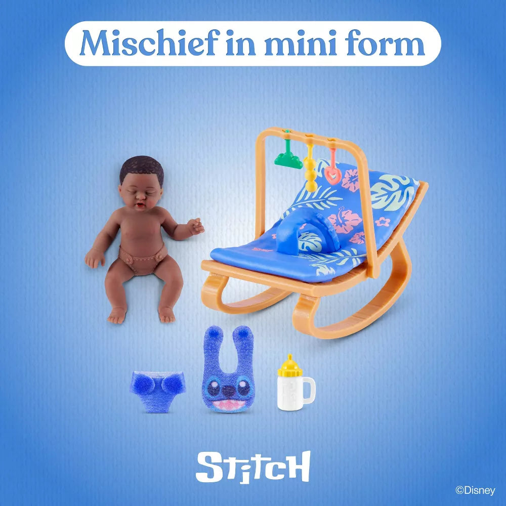 Toy baby doll with accessories on a blue background, featuring the 'Stitch' character.