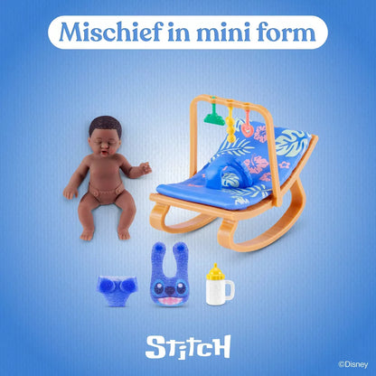 Toy baby doll with accessories on a blue background, featuring the 'Stitch' character.