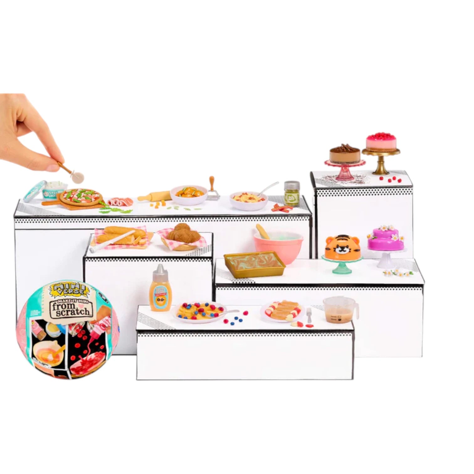 Miniverse Make It Mini From Scratch Series 2 Miniature food set with a hand holding a toy spoon over a white surface
