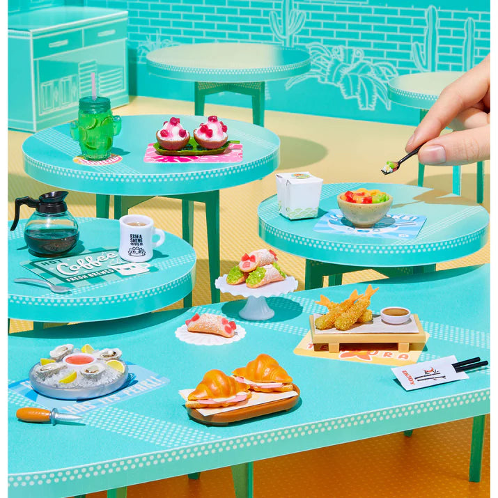 MGA's Miniverse Make It Mini Food Cafe Series 6 surprise capsule and crafted miniature coconut sorbet with raspberry syrup.