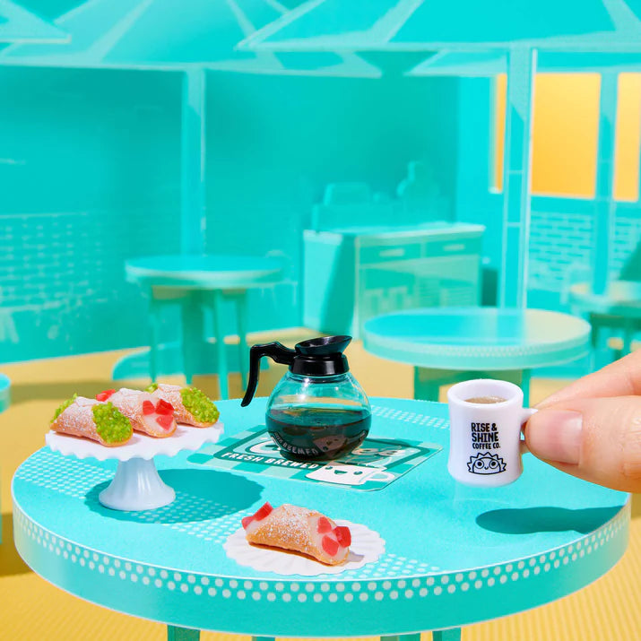 MGA's Miniverse Make It Mini Food Cafe Series 6 surprise capsule and crafted miniature coconut sorbet with raspberry syrup.