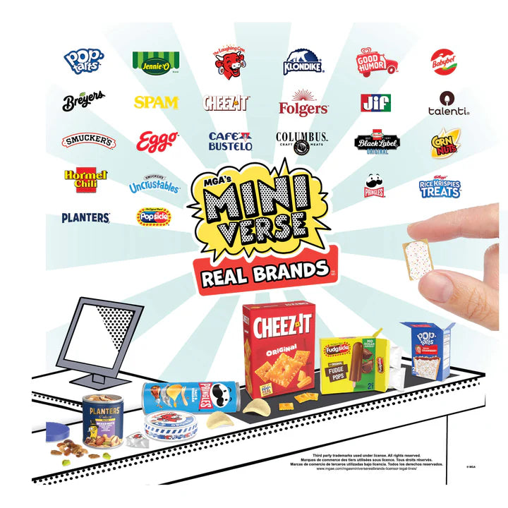 Miniature model of a store with various branded products and a hand holding a small item, featuring logos of well-known brands.