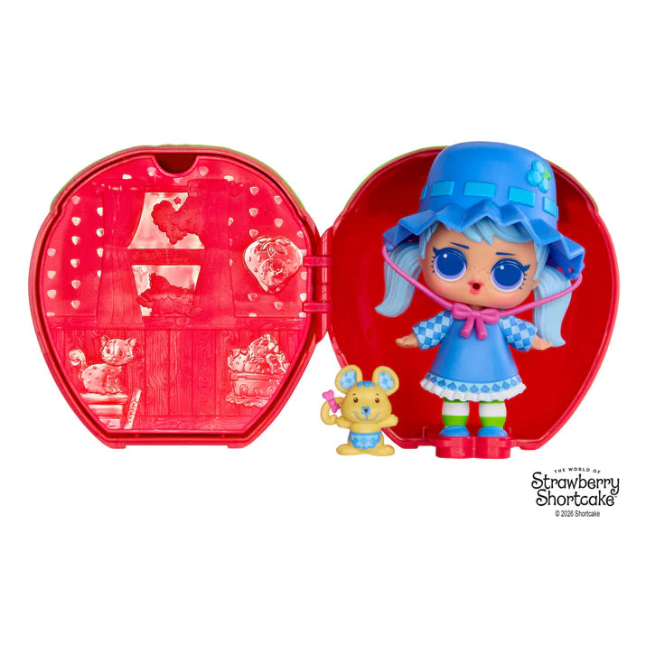 L.O.L. Surprise Loves Strawberry Shortcake scented Tot doll next to her pet cat and transforming Strawberry House playset capsule.