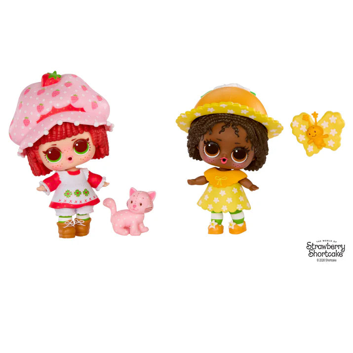 L.O.L. Surprise Loves Strawberry Shortcake scented Tot doll next to her pet cat and transforming Strawberry House playset capsule.