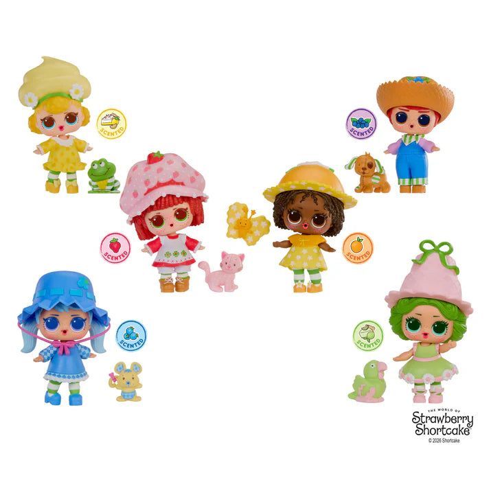 L.O.L. Surprise Loves Strawberry Shortcake scented Tot doll next to her pet cat and transforming Strawberry House playset capsule.
