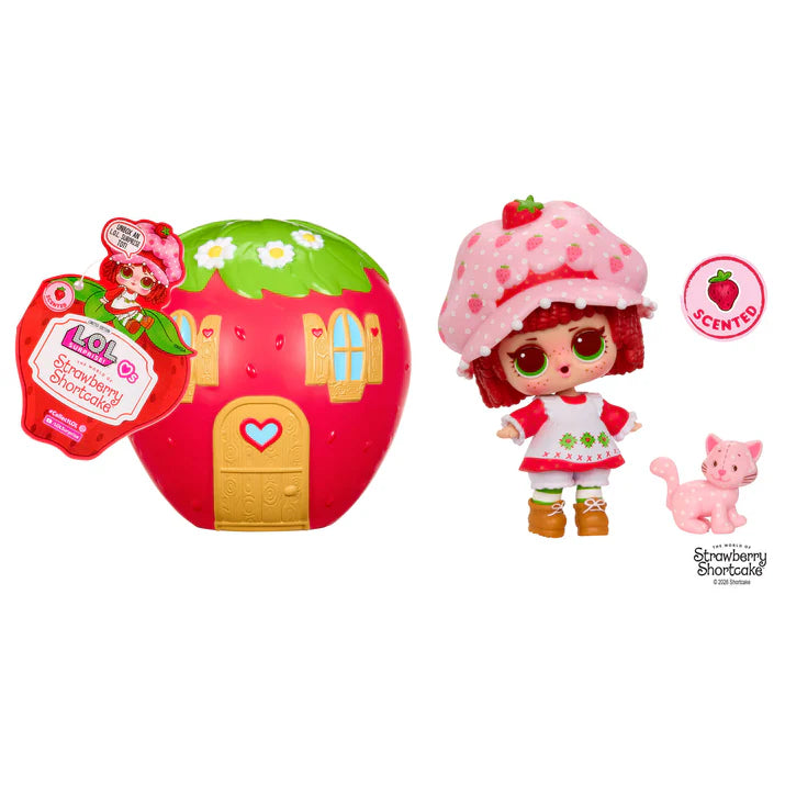 L.O.L. Surprise Loves Strawberry Shortcake scented Tot doll next to her pet cat and transforming Strawberry House playset capsule.
