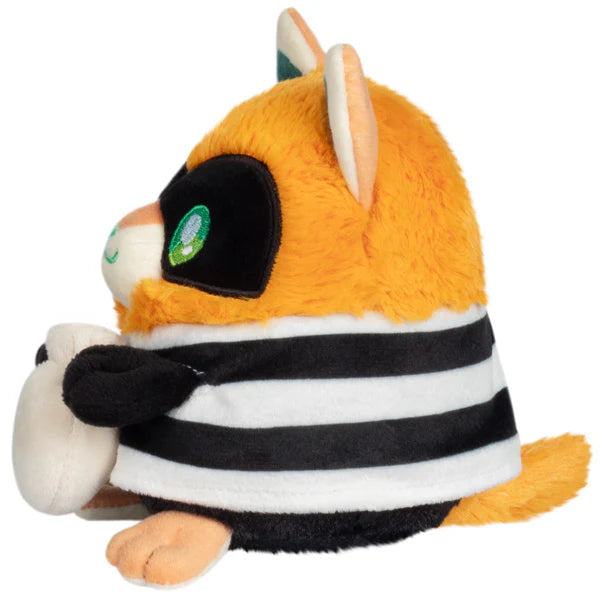 Squishable Alter Egos Series 18 Cat Burglar Kitty 5.5-Inch Plush, an orange cat soft toy in a striped burglar outfit holding a money bag