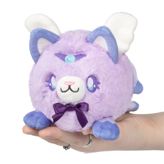 Squishable Alter Egos Series 18 Magical Kitty 4.5-Inch Plush, a lavender cat soft toy with wings and a purple bow