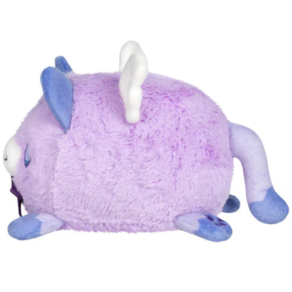 Squishable Alter Egos Series 18 Magical Kitty 4.5-Inch Plush, a lavender cat soft toy with wings and a purple bow